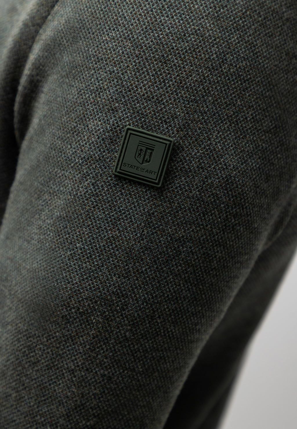 Oxford trui met rubberen badge