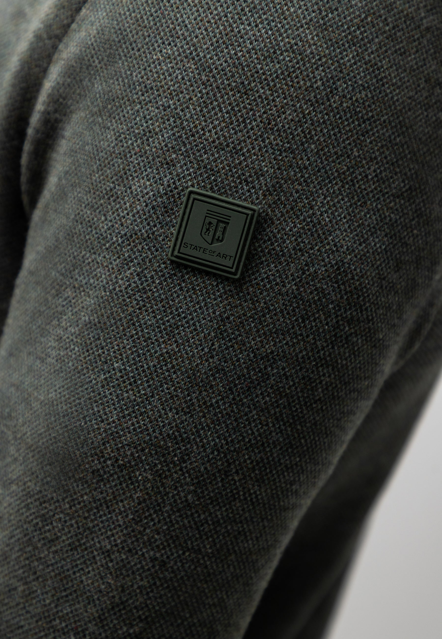 Oxford trui met rubberen badge