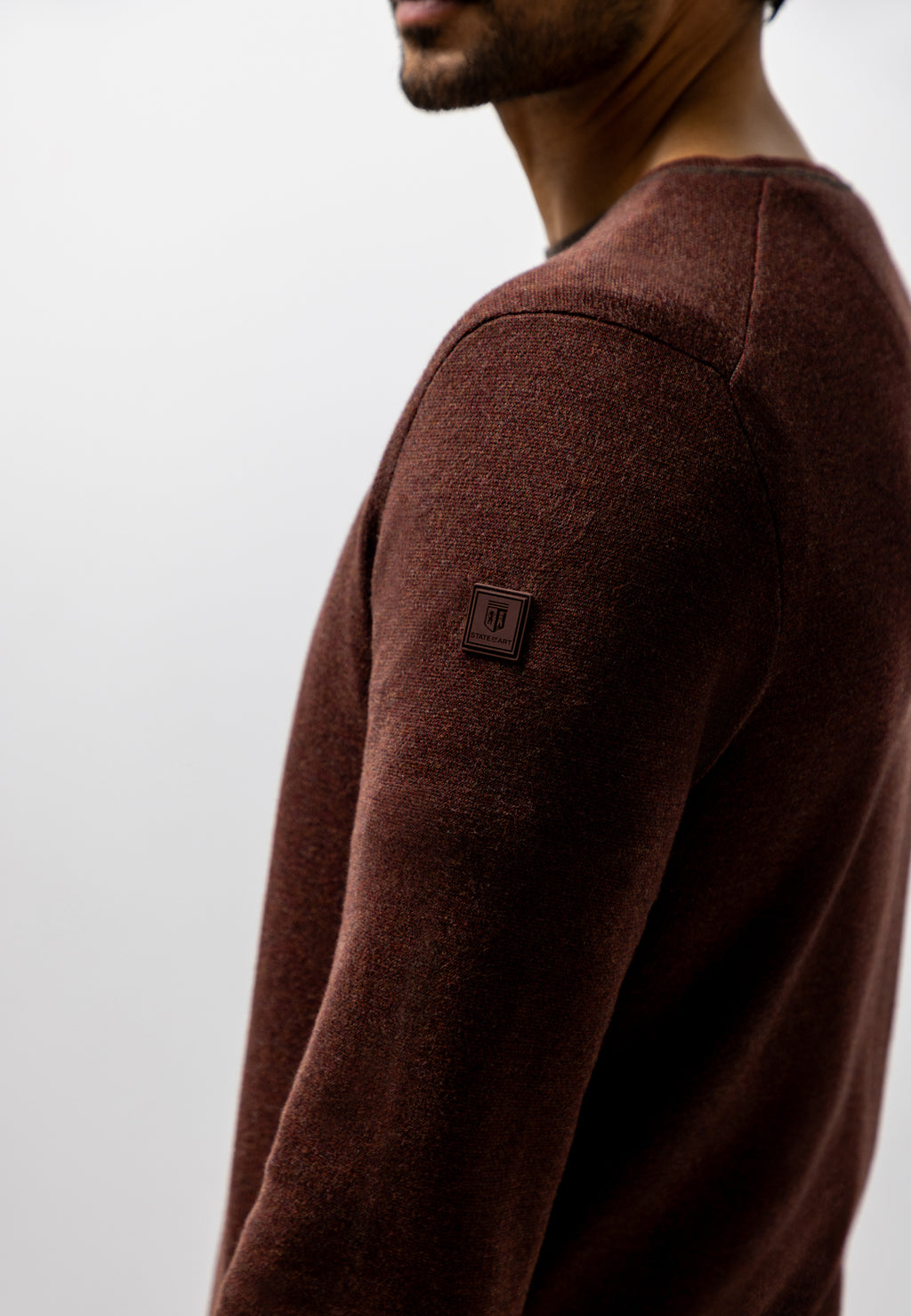 Pull Oxford à badge en caoutchouc