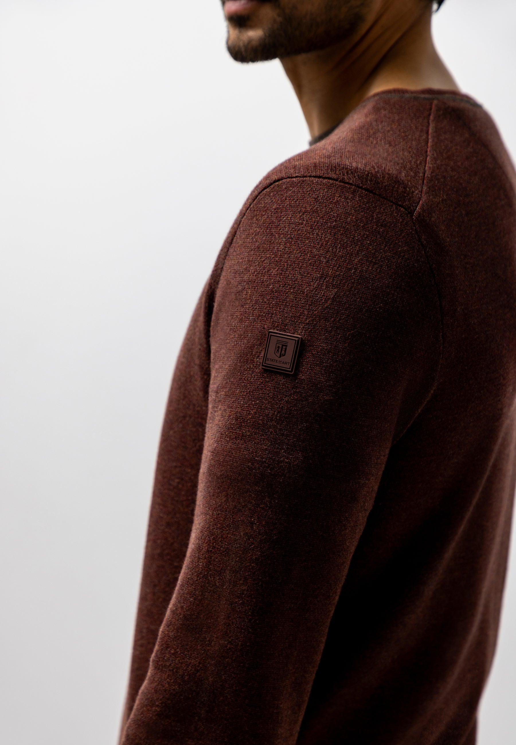 Oxford trui met rubberen badge