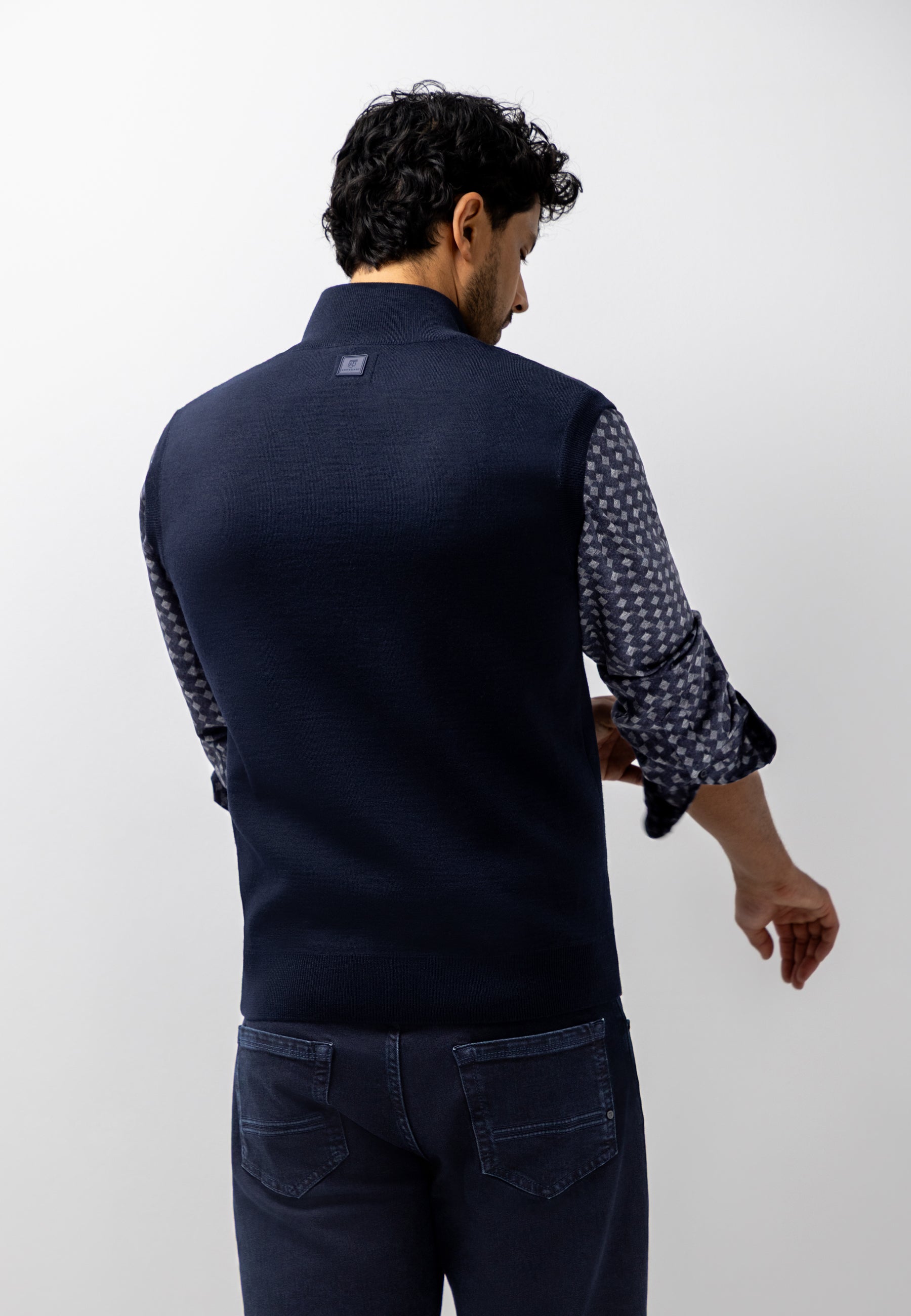 Gilet en maille à poches latérales