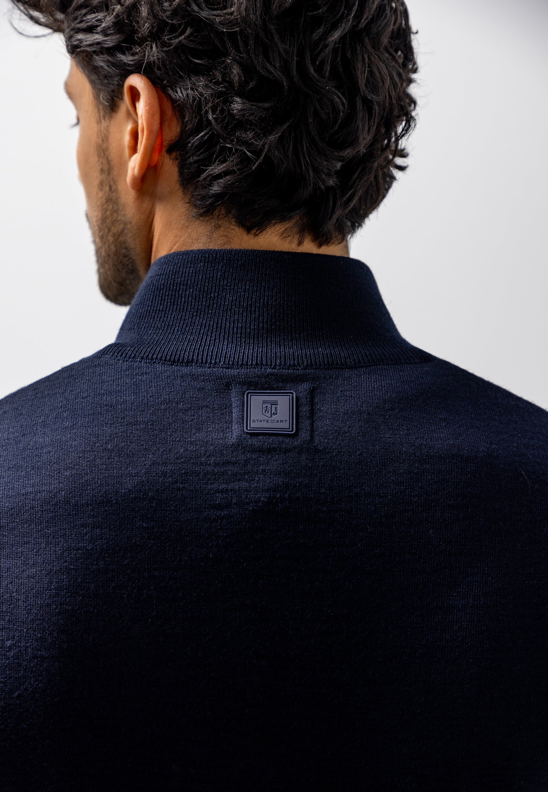 Gilet en maille à poches latérales