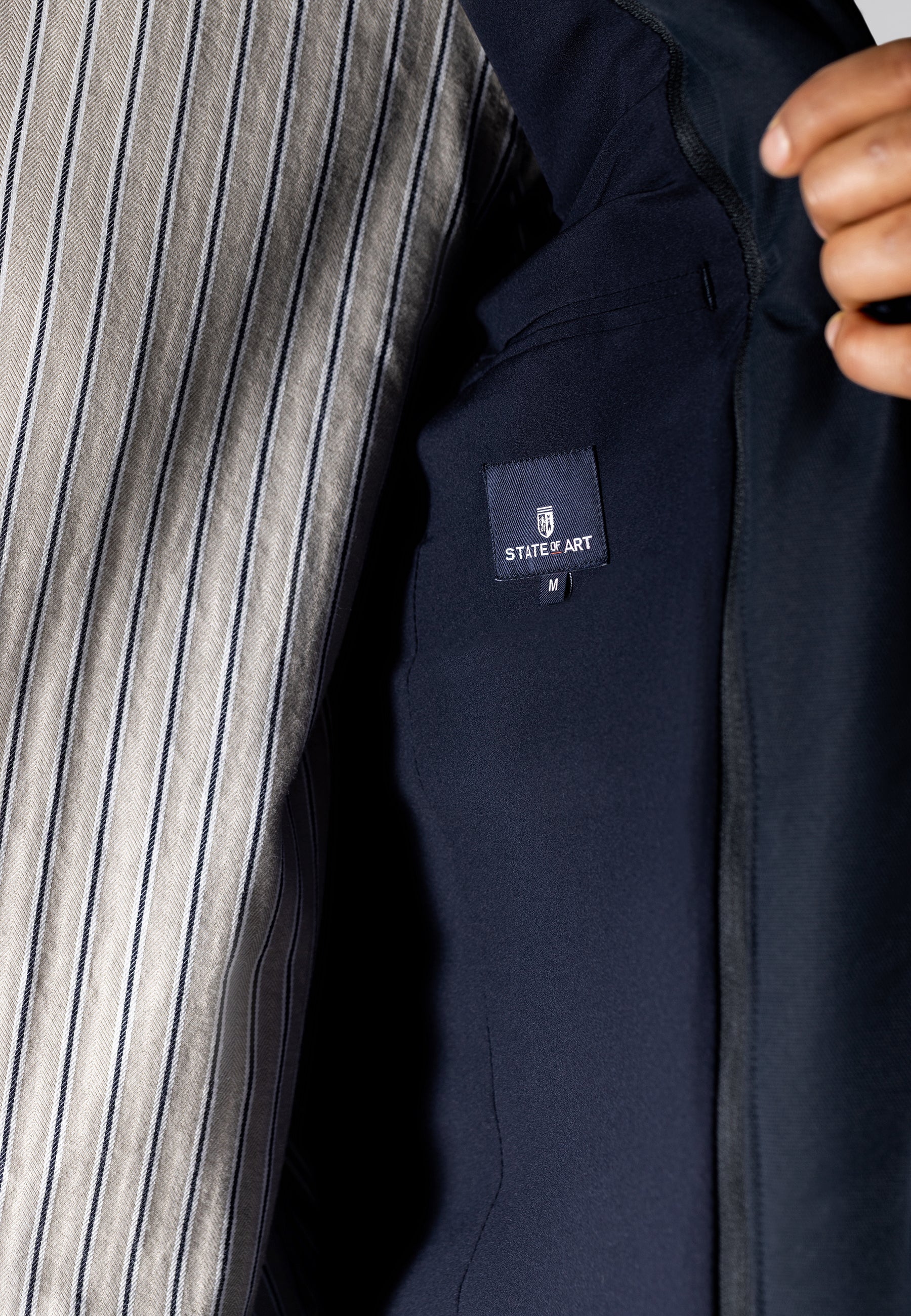 Manteau chiné avec empiècement zippé