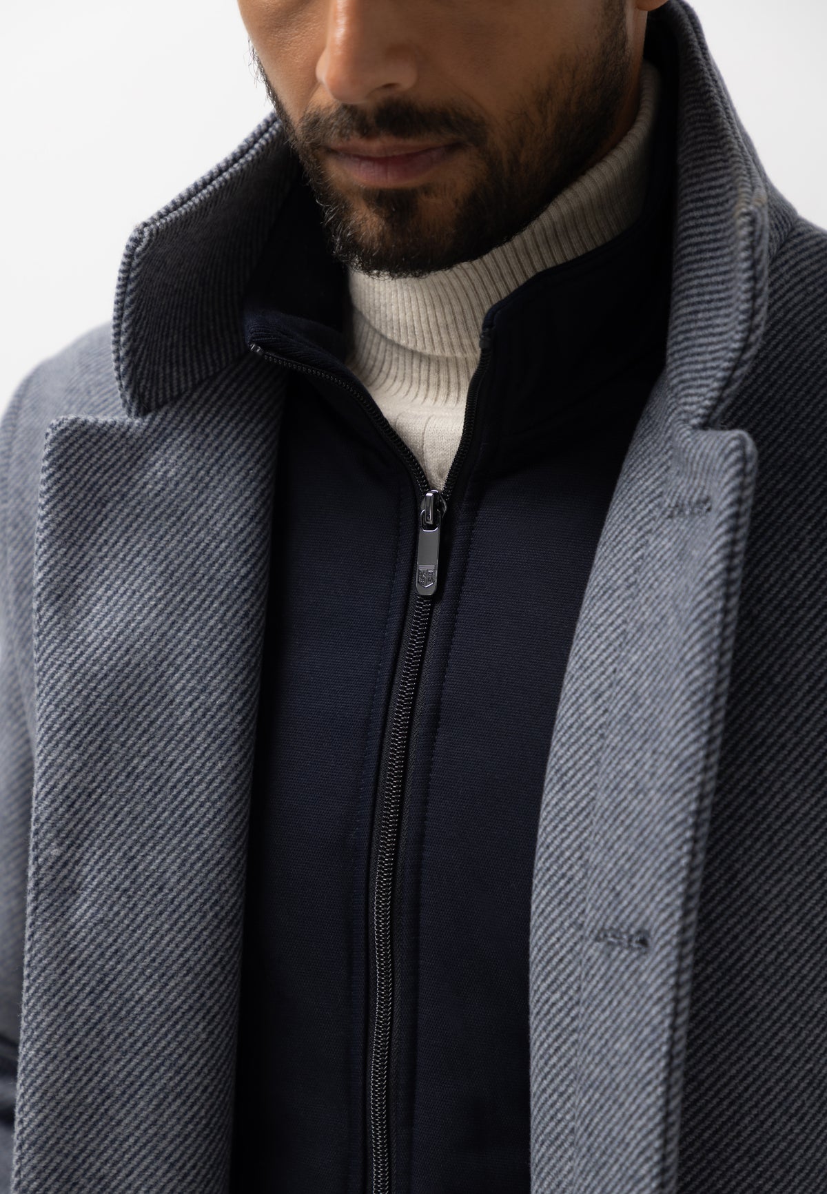 Manteau chiné avec empiècement zippé