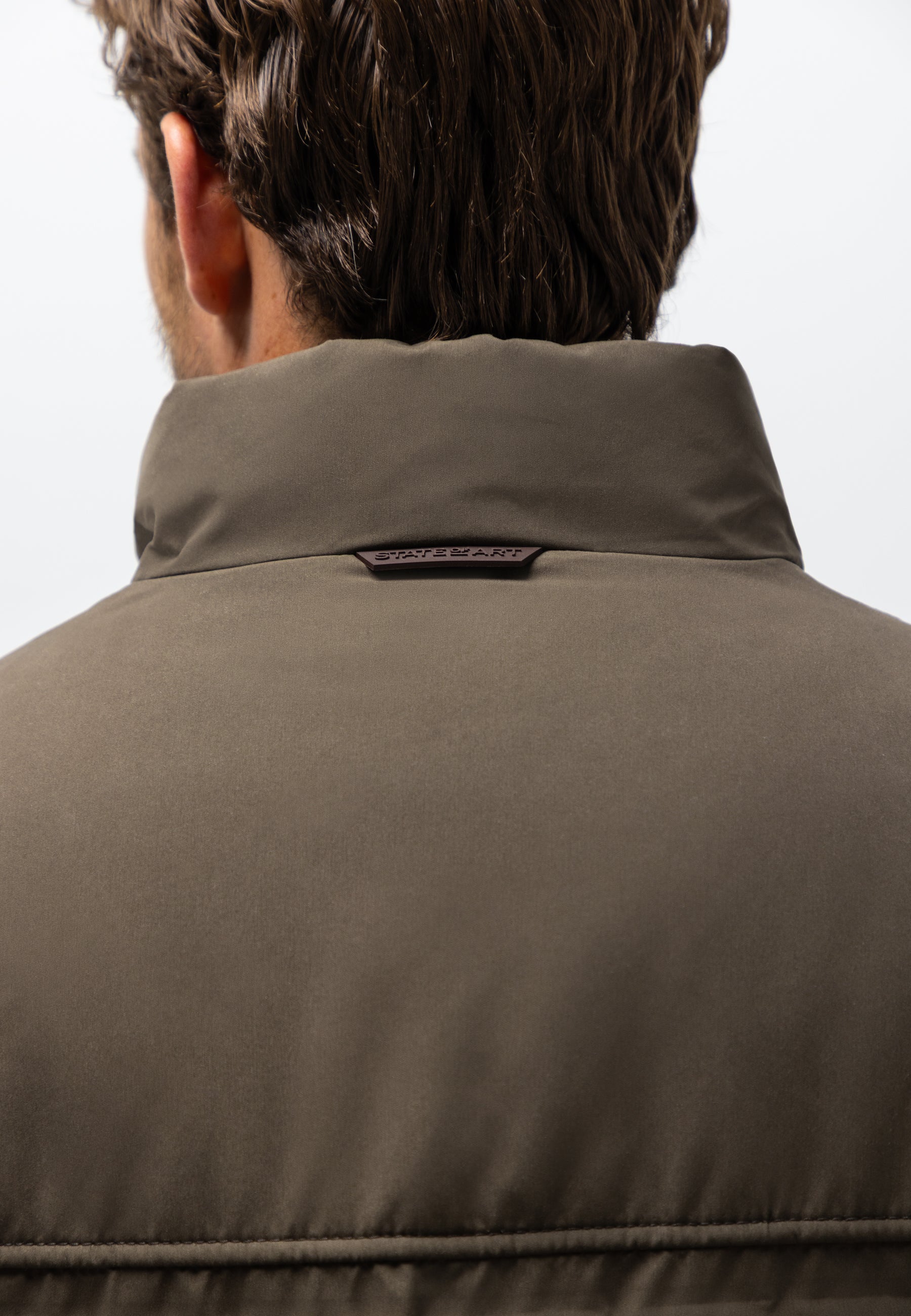 Veste avec badge en caoutchouc