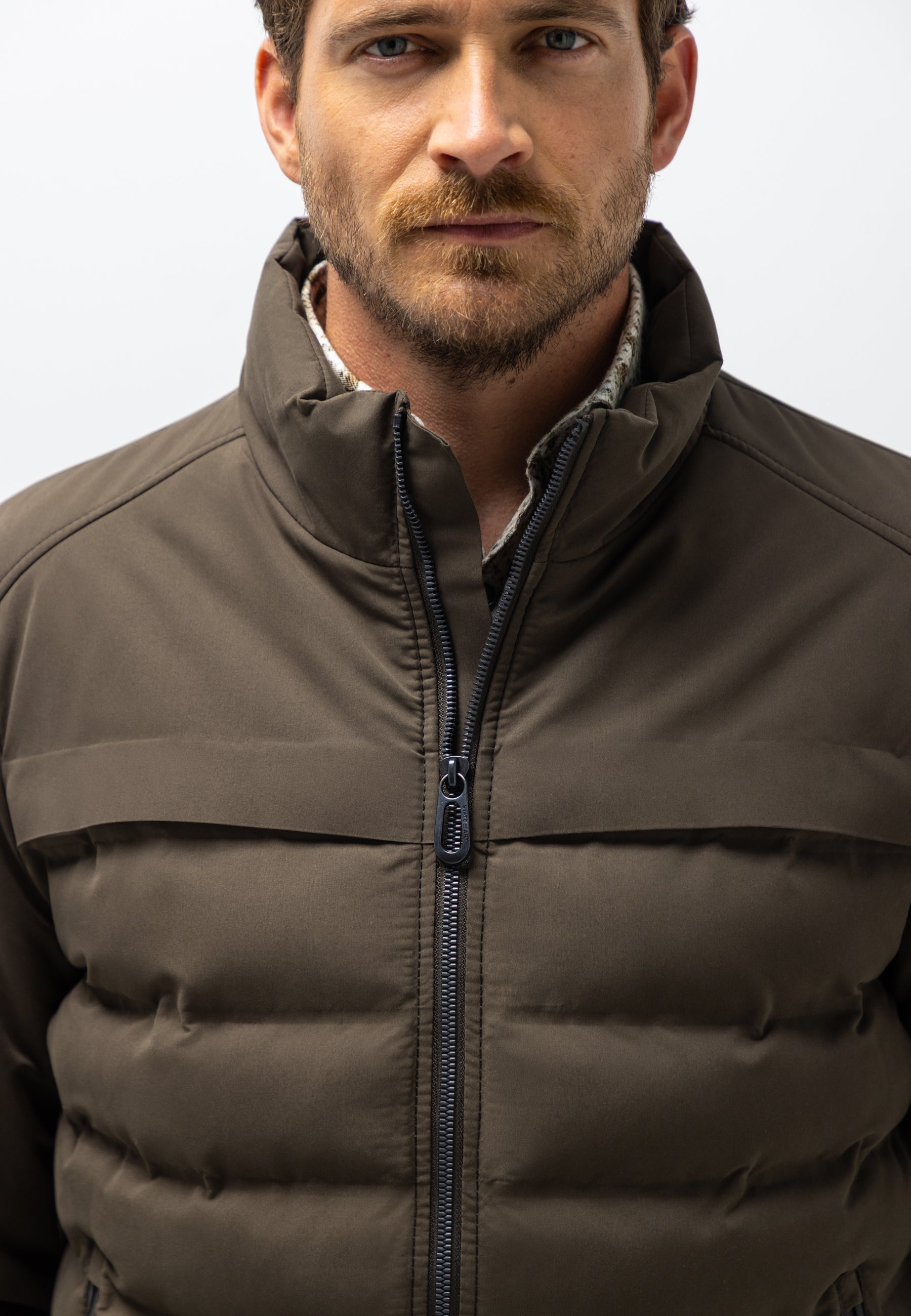 Veste avec badge en caoutchouc