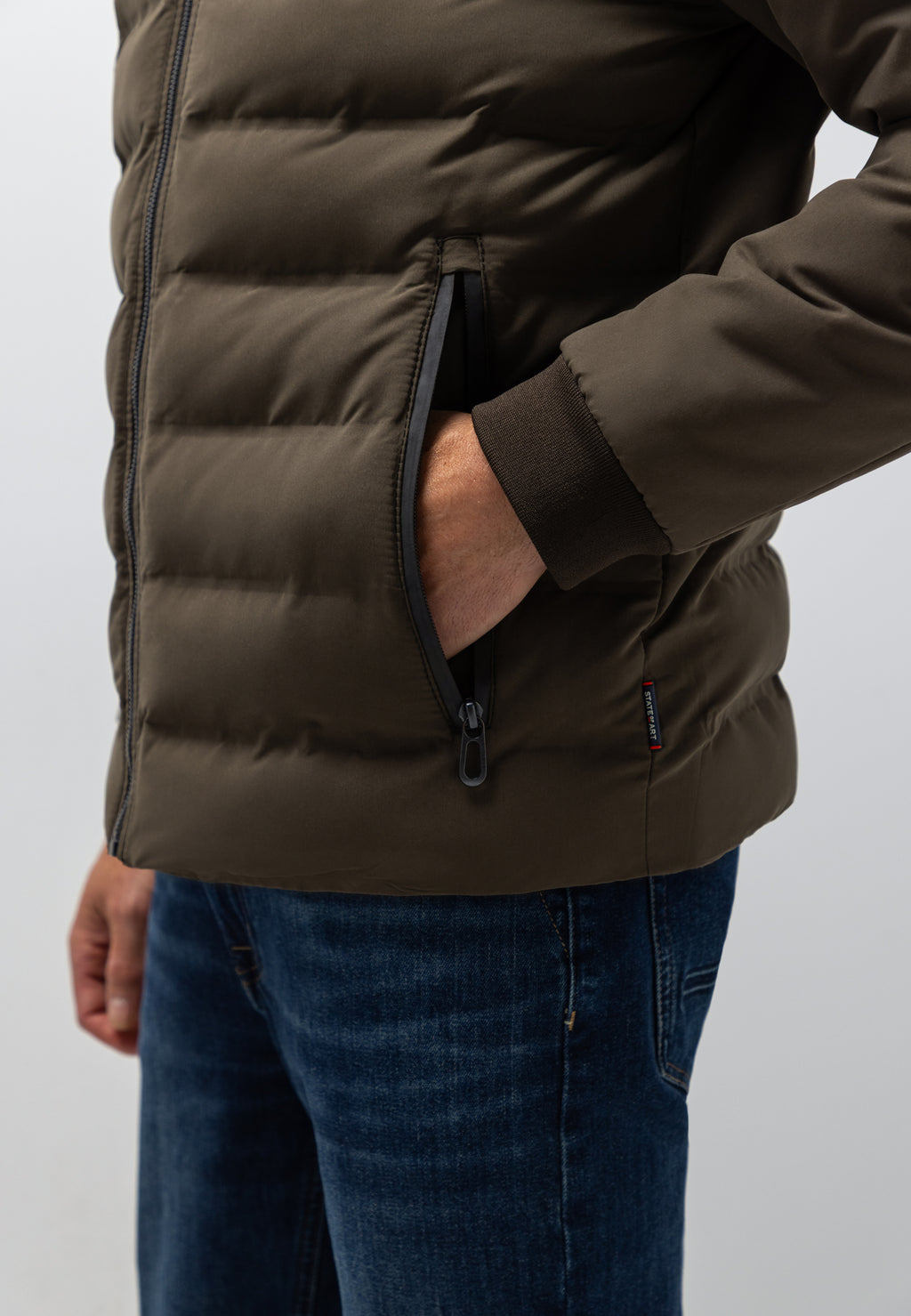 Veste avec badge en caoutchouc