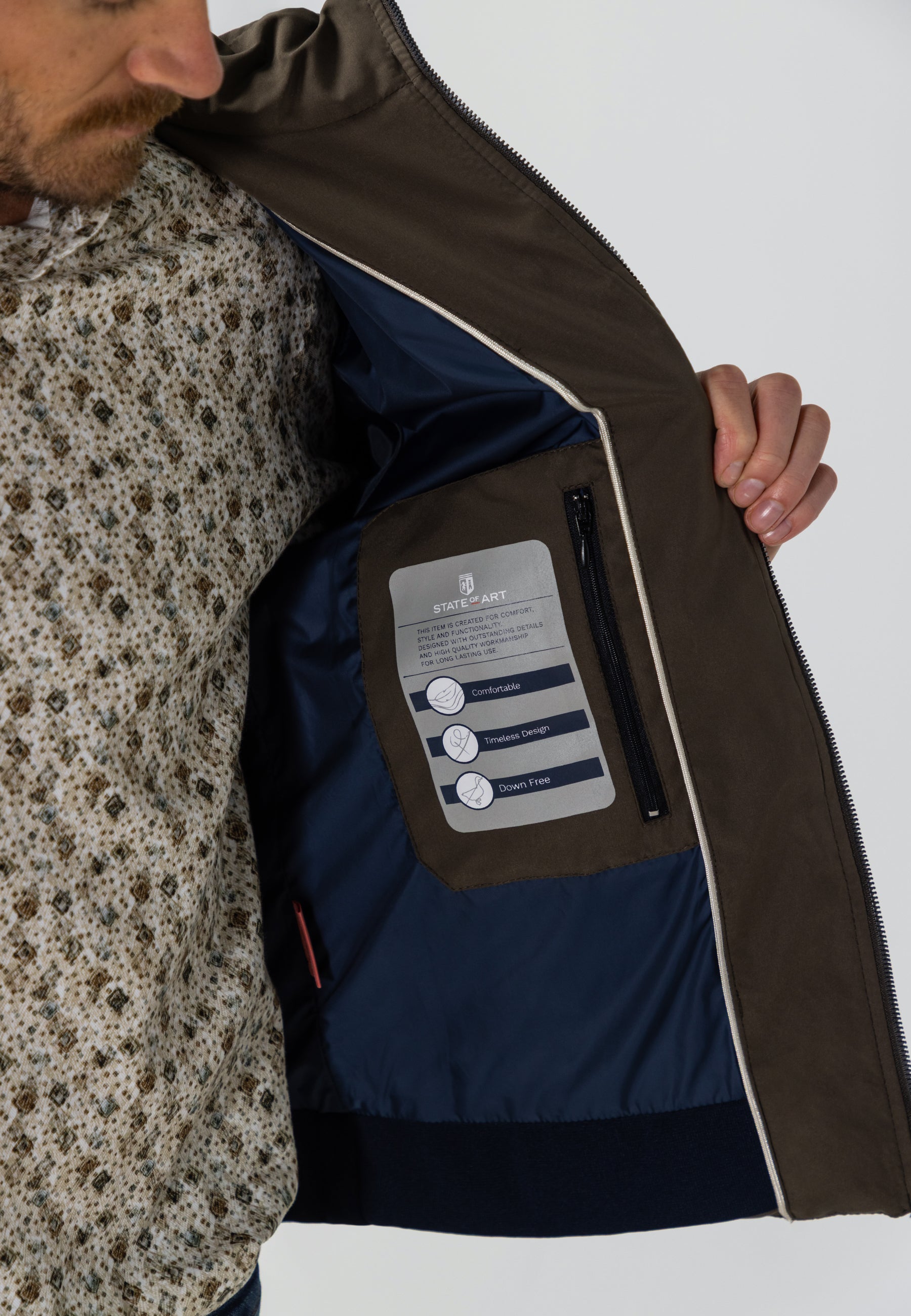 Veste avec badge en caoutchouc