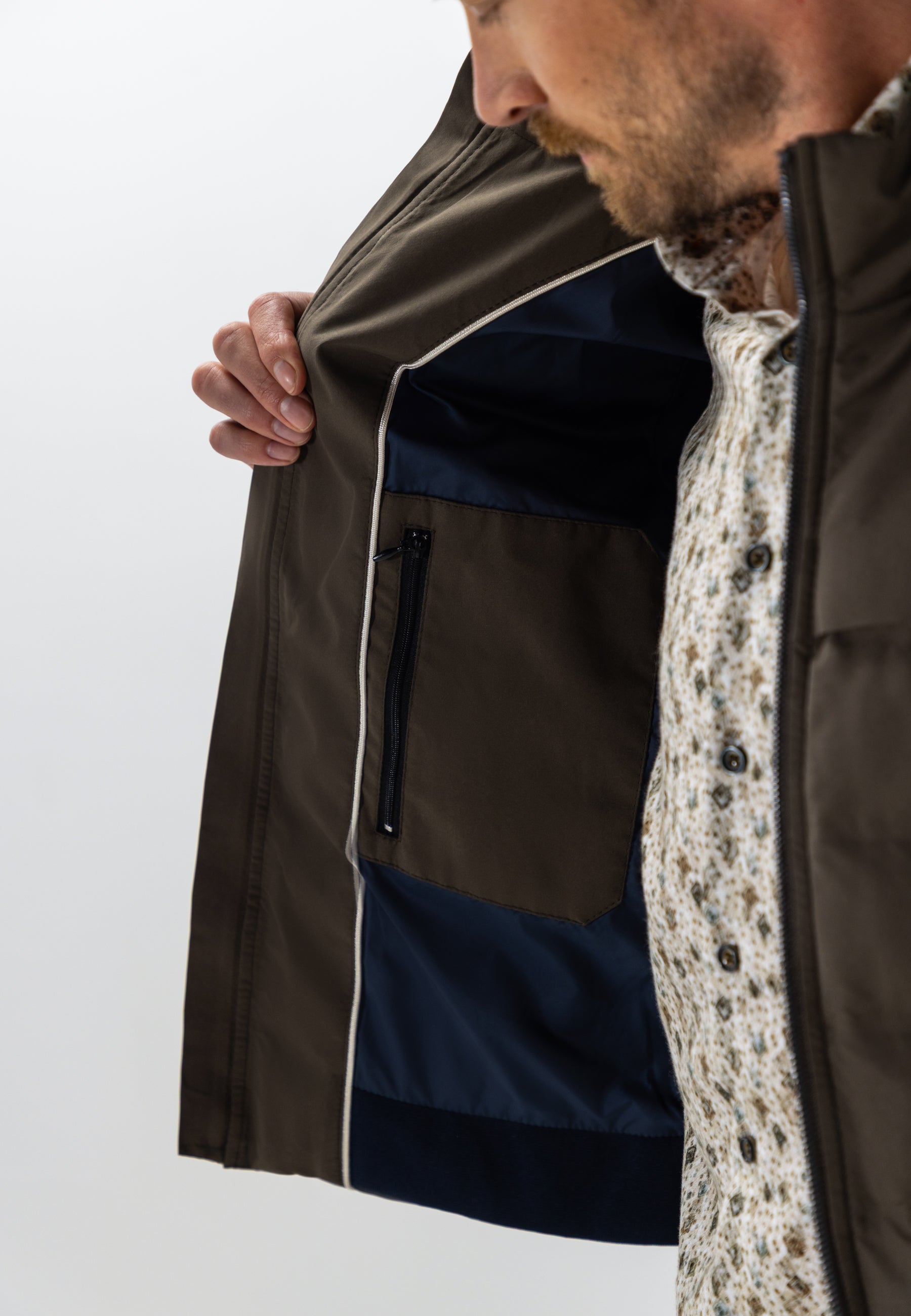 Veste avec badge en caoutchouc